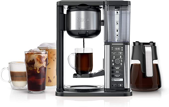 ninja coffee maker with 3 glasses of coffee on the side